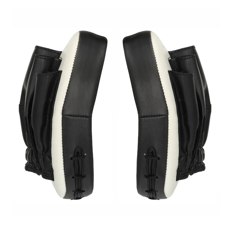 Side view of two white Titan Strikes focus boxing mitts facing each other, highlighting their ergonomic curved design