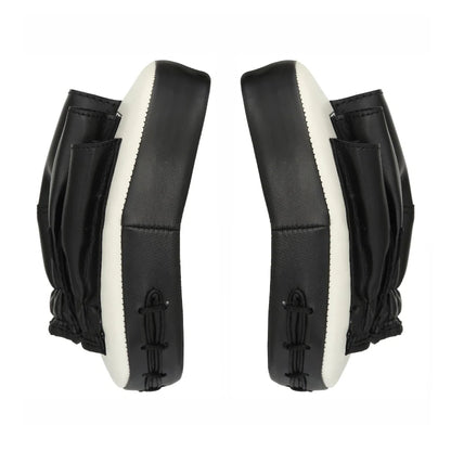 Side view of two white Titan Strikes focus boxing mitts facing each other, highlighting their ergonomic curved design