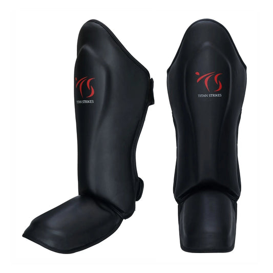 Muay Thai Shin guards black with Titan Strikes logo
